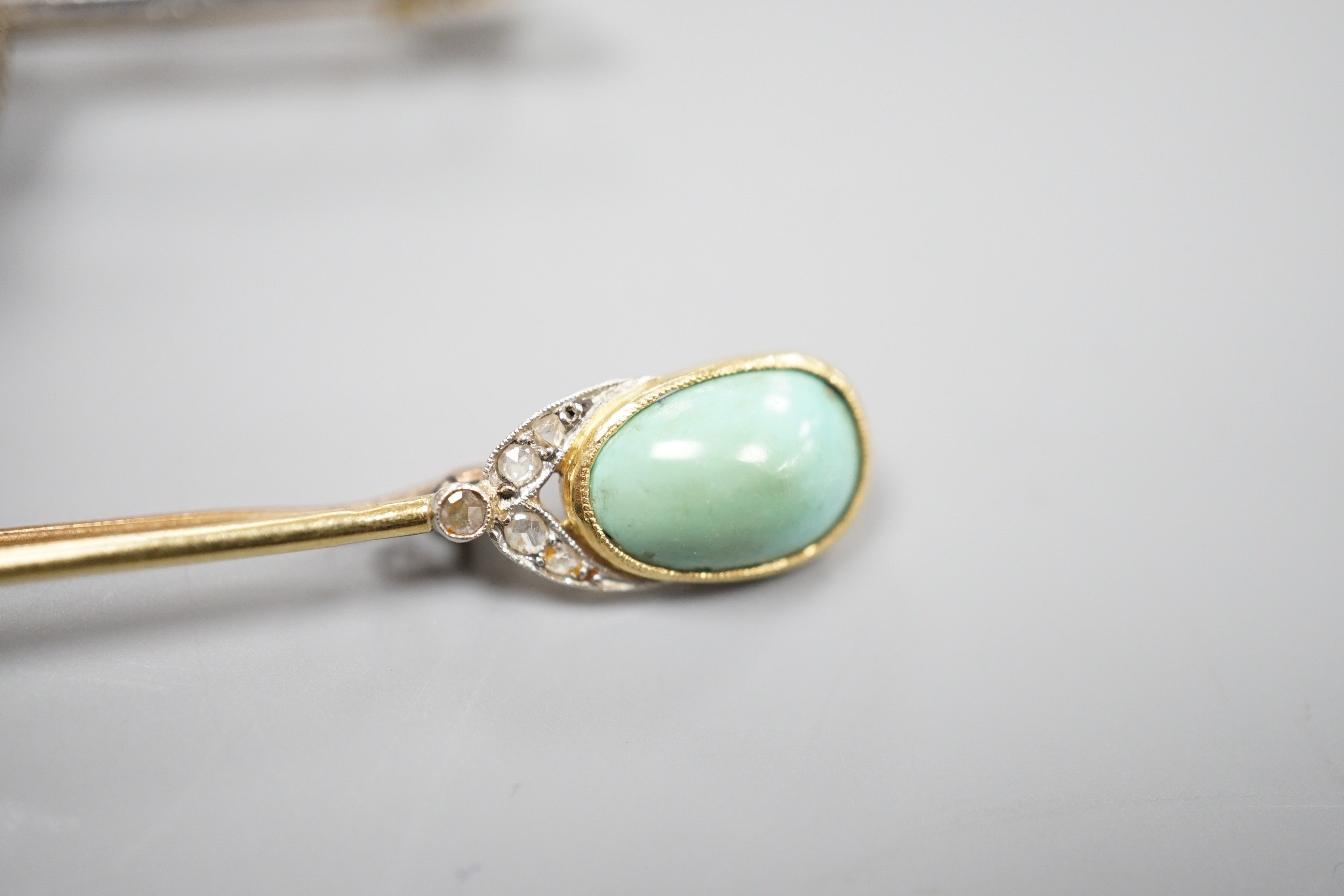 A yellow and white metal, rose cut diamond set fox head bar brooch, 62mm and a yellow metal, rose cut diamond and turquoise set bar brooch, gross weight 11.6 grams.